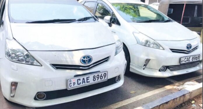 Two cars with same number plate seized in separate areas