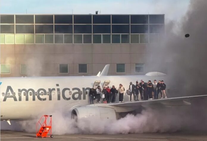 American Airlines plane catches fire (Video)